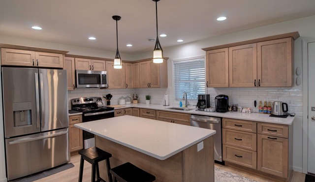 New 3-bed/2 bath home with Game Room, Screened Porch and Firepit.