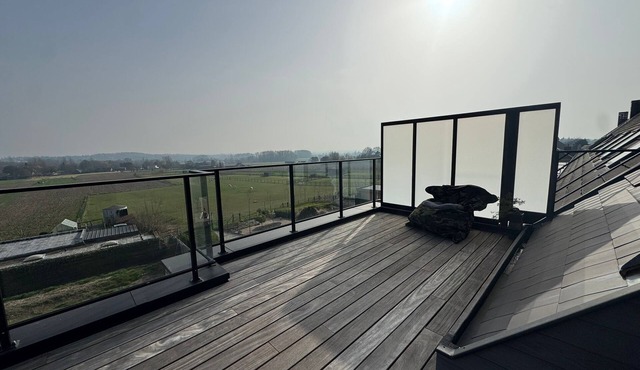 Newly built apartment with beautiful spacious sun terrace - view of Pajottenland