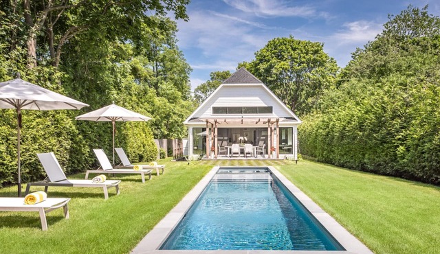 Newly constructed contemporary home, gunite heated pool, hot tub, deck with.