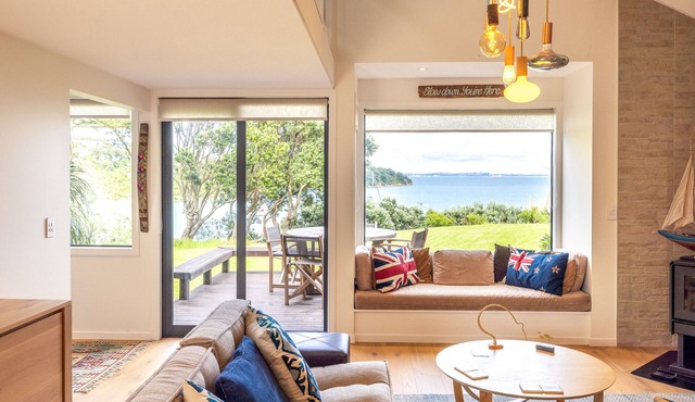 Newly renovated waterfront home with good indoor living and leading to the beach
