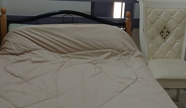 Nice bedroom in a 3 bedrooms apartment with WiFi, AC at the heart of Abu Dhabi