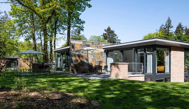 Nice holiday home in a wooded area