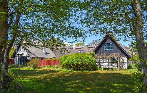 Nice Home In Borrby With Sauna