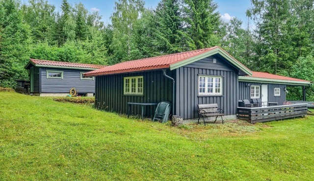 Nice home in Sagstua with lake view