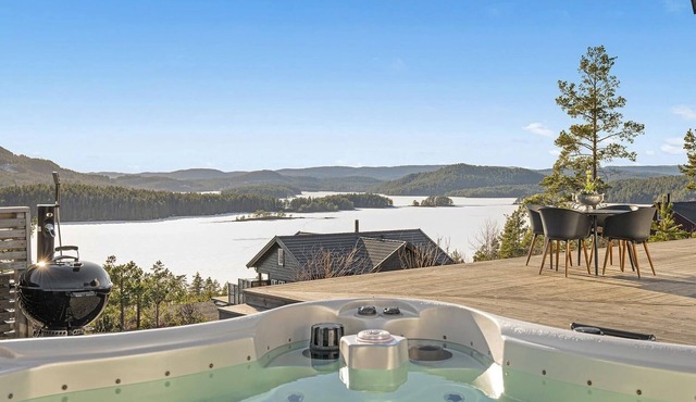 Nice home in Sannidal with lake view