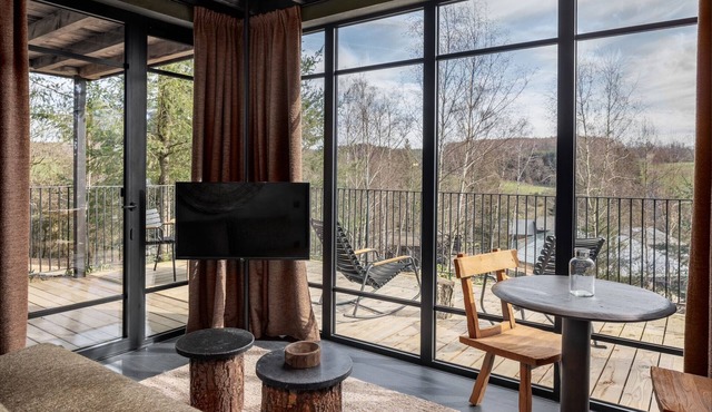 Nice lodge with a view on a natural resort
