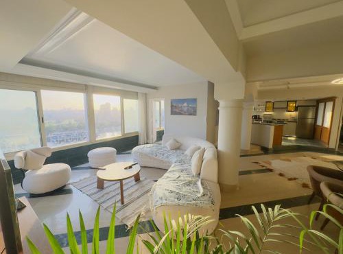 Nilefront Elegance Apartment Between Zamalek & Downtown