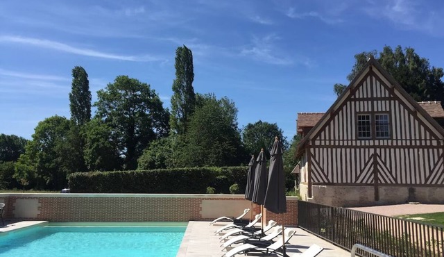 Normandy Manor Family Stay w/Spacious Rooms, Pool & Outdoor Green Spaces