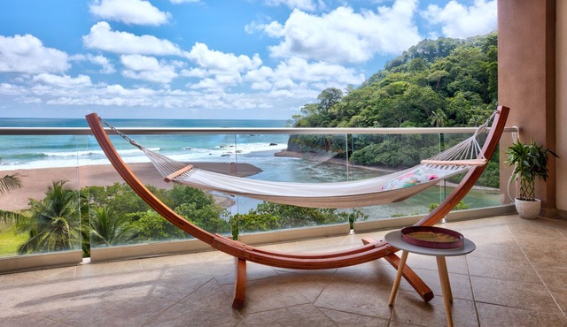 Oceanfront apartment with private balcony, stunning views & pool access