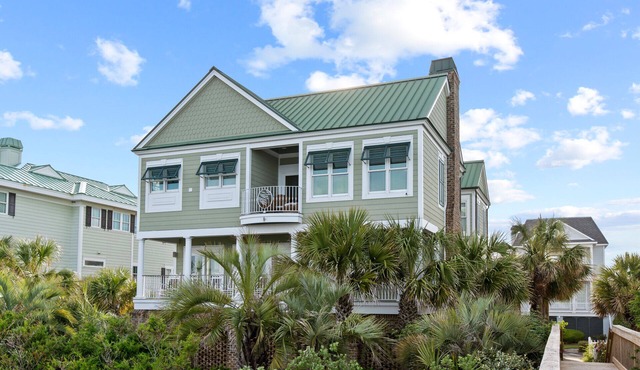 Oceanfront Beach Home with pool access located in Charlestowne Grant community.