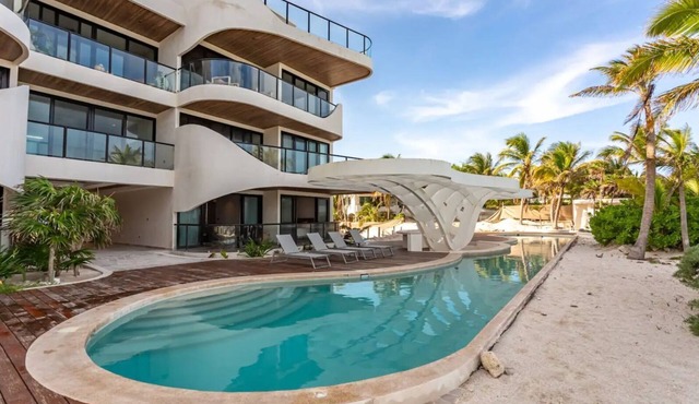 Oceanfront Dreams: Immerse yourself in unforgettable sunrises in front of the Caribbean.