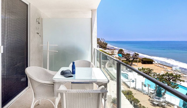 Oceanfront Gem w/Balcony, Pool, Hot Tub & Carbon Beach Access | Bluewater Haven