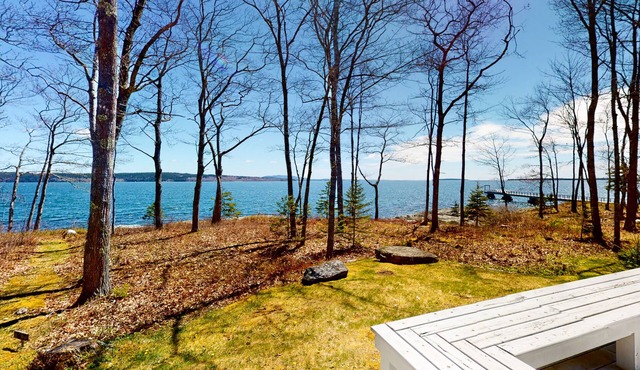 Oceanfront retreat with sunrise views, screened porch, & deck
