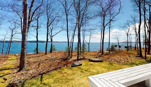 Oceanfront retreat with sunrise views, screened porch, & deck
