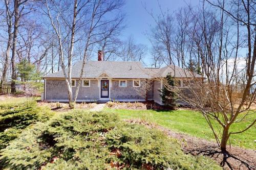 Oceanfront retreat with sunrise views, screened porch, & deck