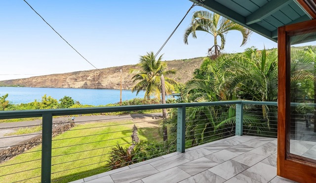 Oceanfront sanctuary with light-filled interior, lanai, W/D, & full kitchen