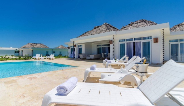 Oceanfront villa on a sandy beach, private pool & golf cart, gym/tennis!