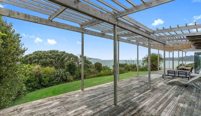 Oceanview Sanctuary - Modern, sunny holiday home with extensive decks and stunning views over Bream Bay