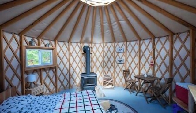 Off-Grid Red Yurt in the wood