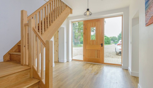 Offering spacious accommodation, this detached property is set over three floors and is well placed