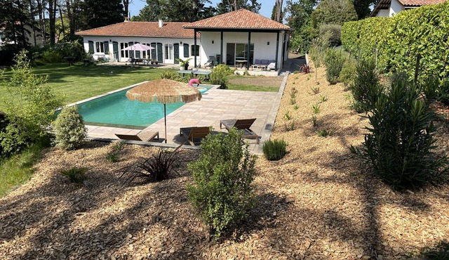 On an exceptional plot of land, recently built house ideally located