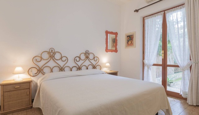 On the ground floor of a small building consists of a living room with double sofa bed, kitchenette,