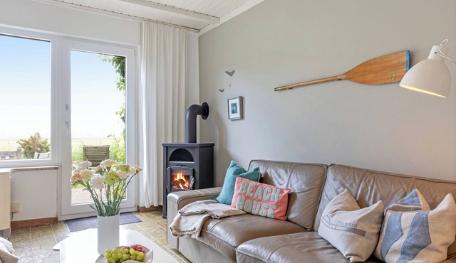 On the wildly romantic natural beach, enchanting view, cozy with stove, sauna