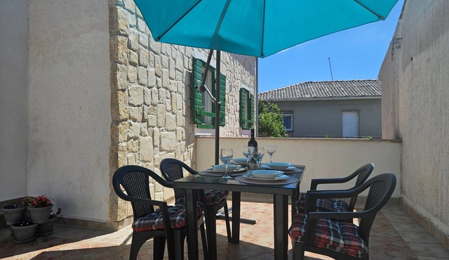 One bedroom apartment with terrace and sea view Povljana, Pag (A-15532-a)