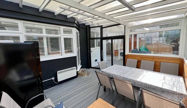 One of a kind 3-bed garden apartment with BBQ & sauna