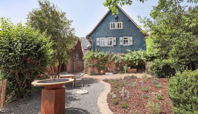 Original blue Odenwald country house with garden and barn