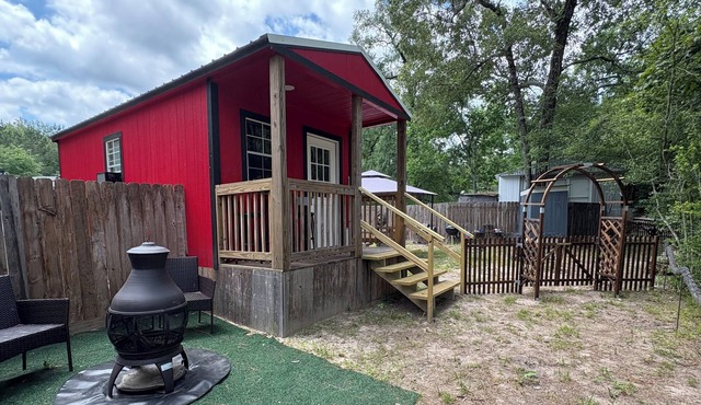 Our CozyNest is a 200sq ft Tiny House Located on Harmon Creek in Huntsville Tx .