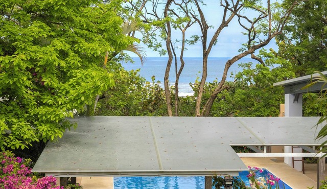 Outdoor Living in Absolute Privacy Steps from the Water's Edge