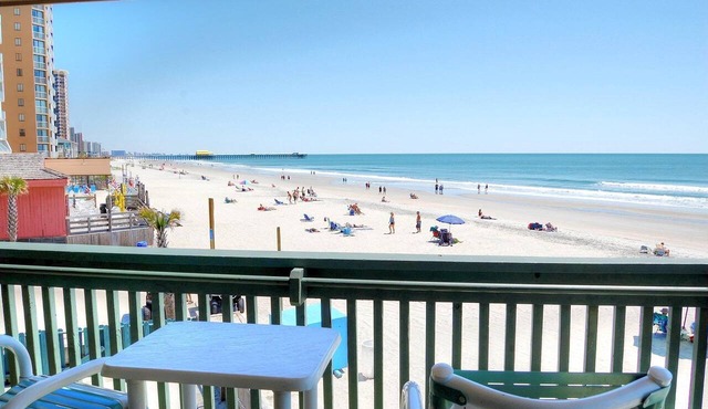 Outstanding ocean front views in fabulous beach condo location!
