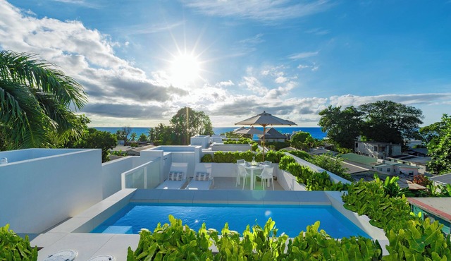 Palm Grove Villas & Hotel