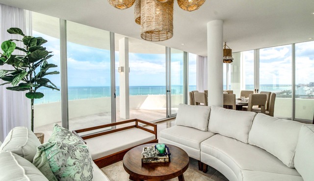 Palm-lined penthouse with plunge pool, amazing views, sauna, & balcony
