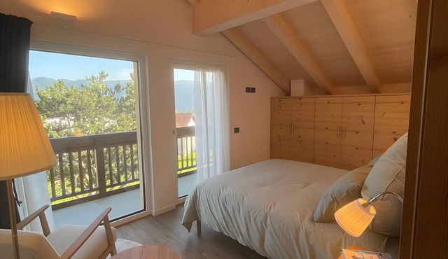 Panoramic Attic with Balcony, Parking, and Garden