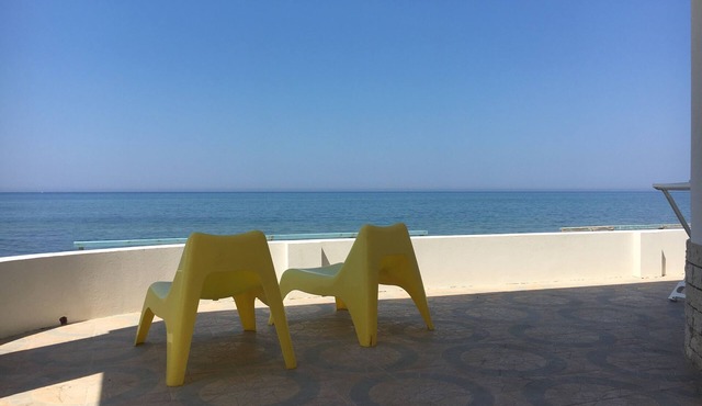 Panoramic house with veranda on the sea