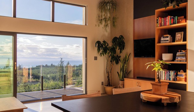 Panoramic ocean-view home tucked into the peaceful forest in beautiful Shirley.