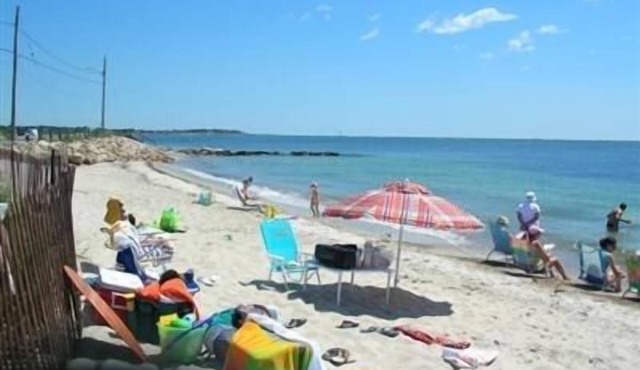 Panoramic ocean views, steps to beach and bike path