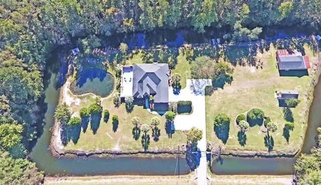 Paradise Palms surrounded by man made mote in Manning, South Carolina!