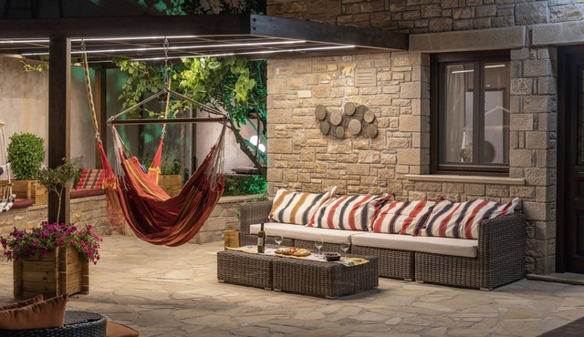 Paradisos traditional stone villa with whirlpool next to beach