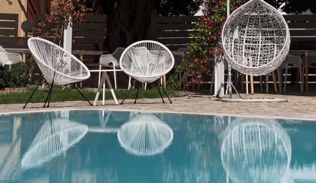 Peaceful complex with swimming pool near the beach in relaxing surroundings