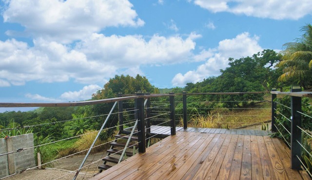 Peaceful Hillside Retreat Modern 2BR Ocean View Solar Backup Near Roseau