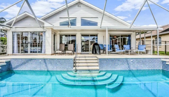 Peaceful Waterfront Pool Home by RedAwning