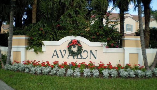 PELICAN BAY. Charming 3-bedroom townhome in exclusive Pelican Bay community.