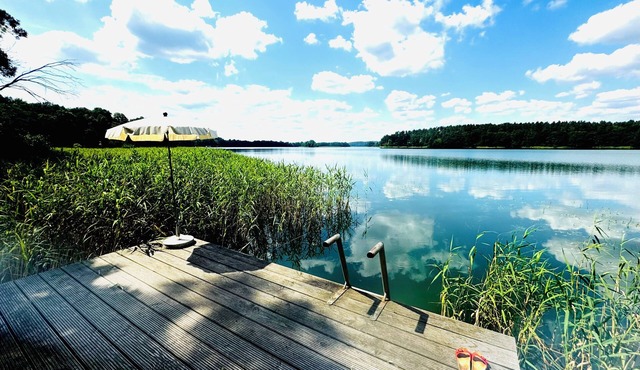Perfect apartment with panoramic view, lake, jetty, boat, sauna - peace and lots of space