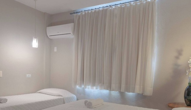 Perfect Executive Triple Room for a Couple and Friend in Central Curitiba Stay