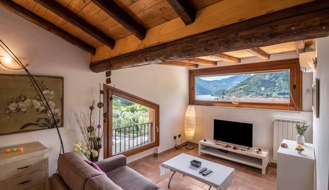 Pet-Friendly Apartment "Mansarda con vista lago" with Lake View, Pool, Wi-Fi & Terrace