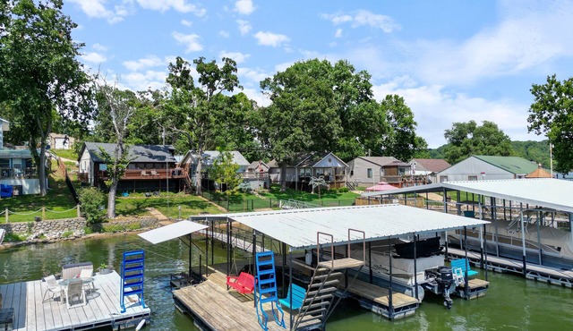 Pet-Friendly Lakefront Home in a Quiet Cove w/Netflix, Outdoor Seating, Boat Slip