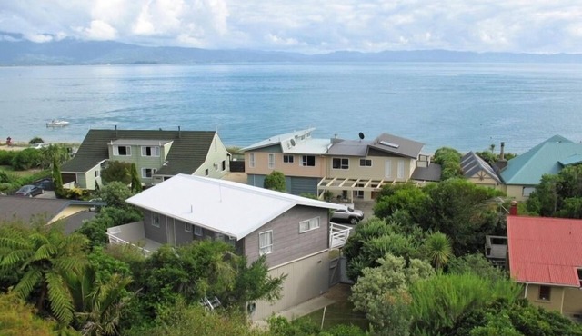 Pet friendly yard, great Sea Views and just across the road from Tata Beach